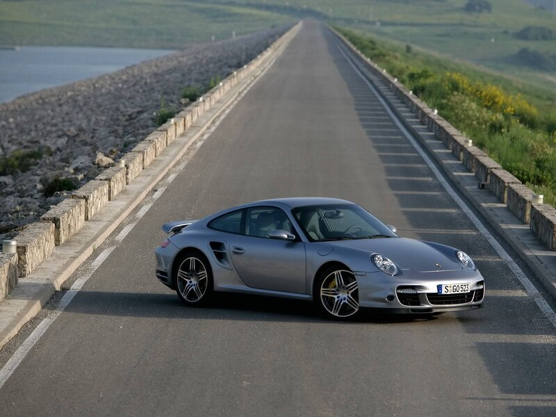 Silver Porsche on Road