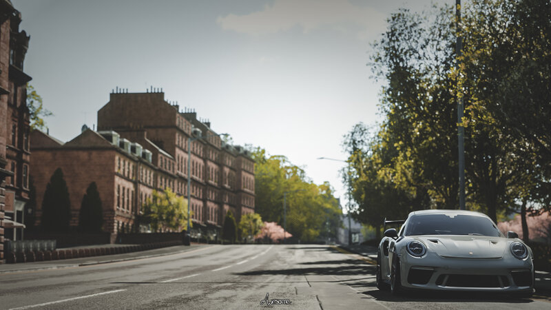 Silver Porsche on Street