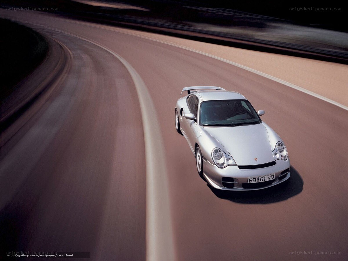 silver porsche on winding road