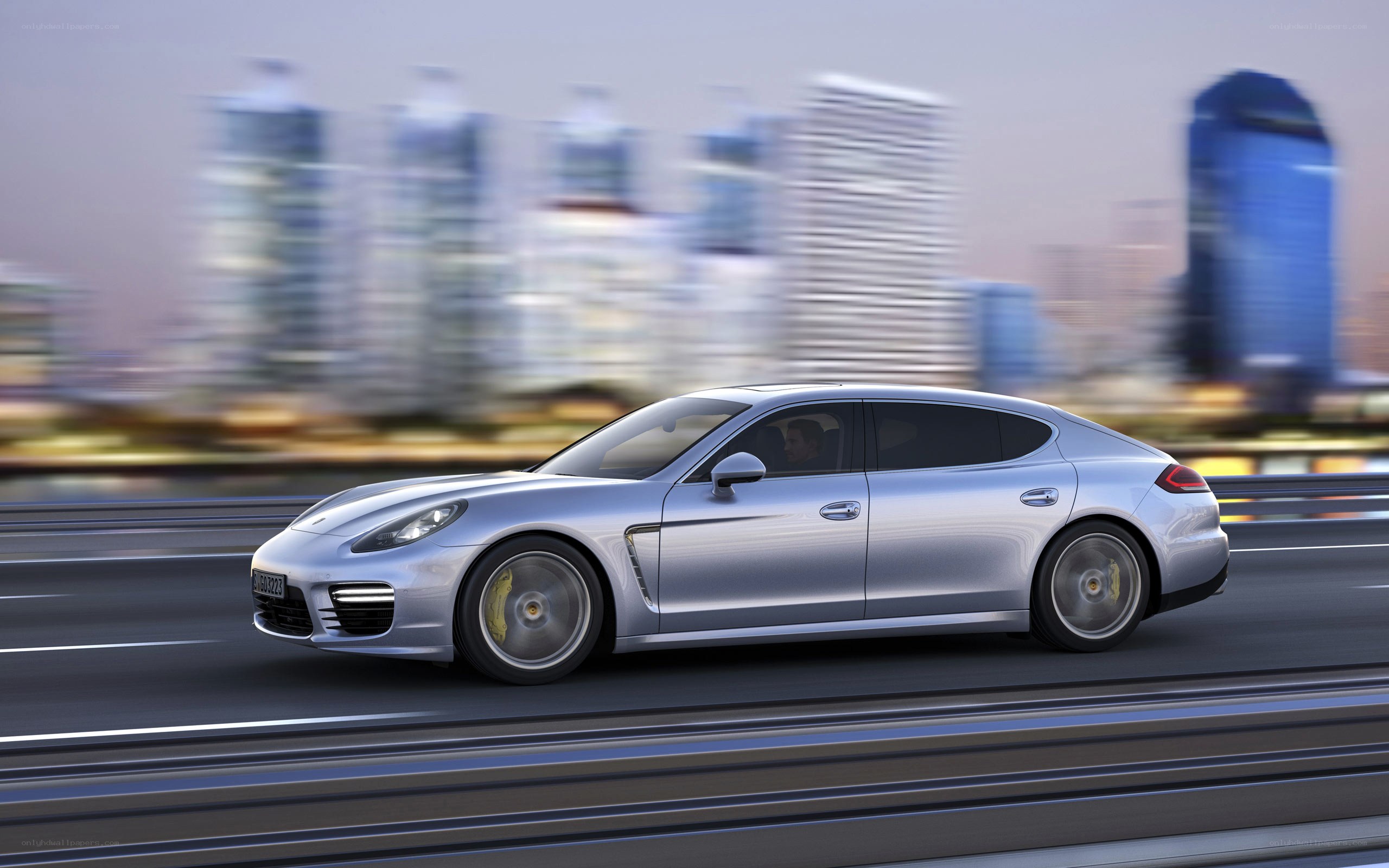 silver porsche panamera in motion