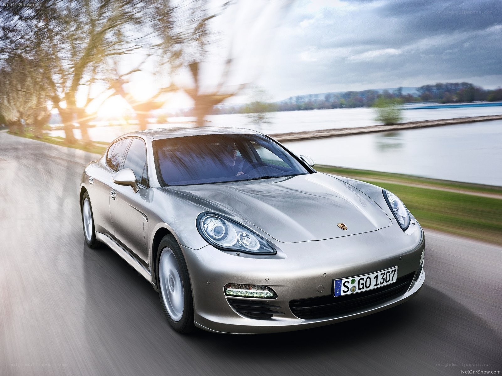 silver porsche panamera in motion