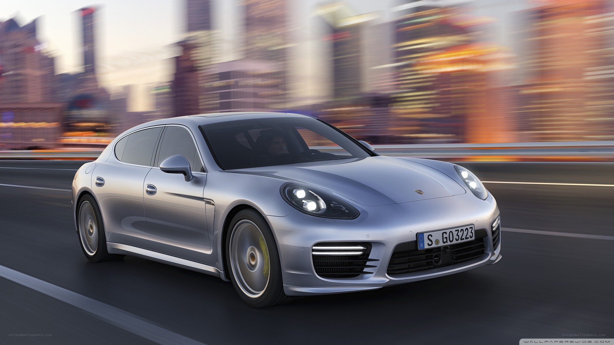 silver porsche panamera in motion