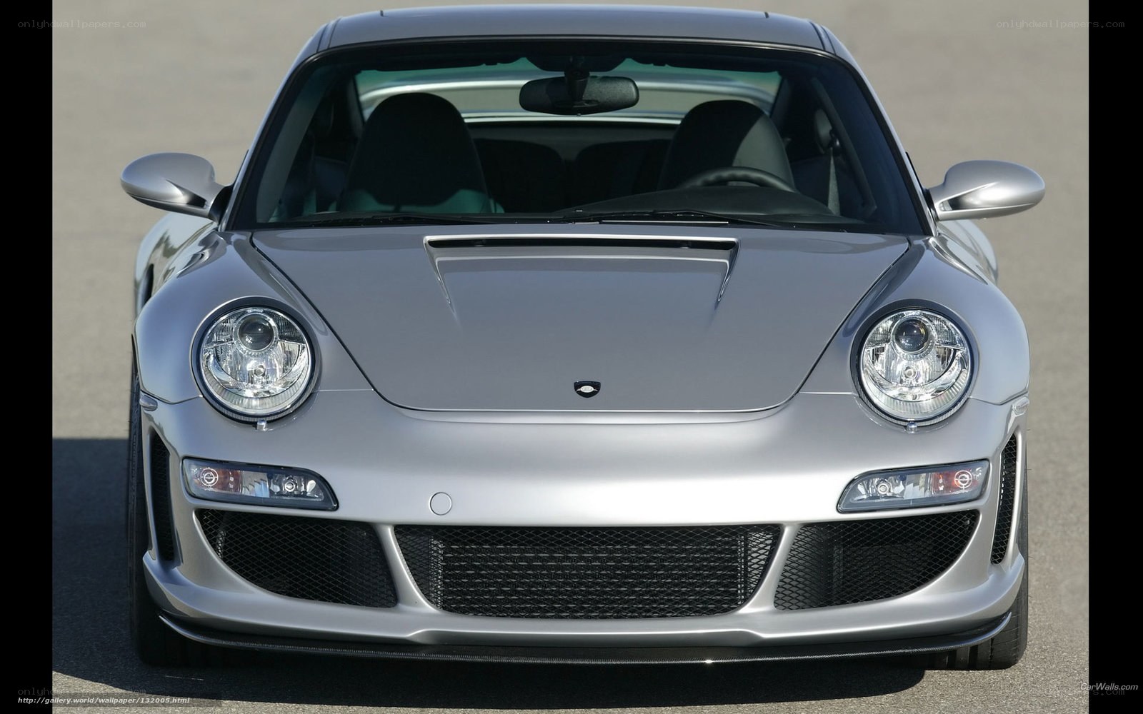 silver porsche sports car