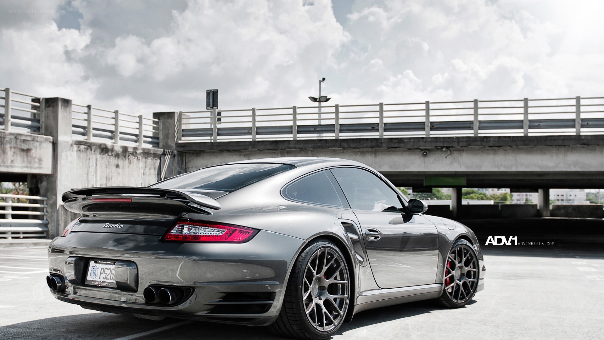 silver porsche turbo parked