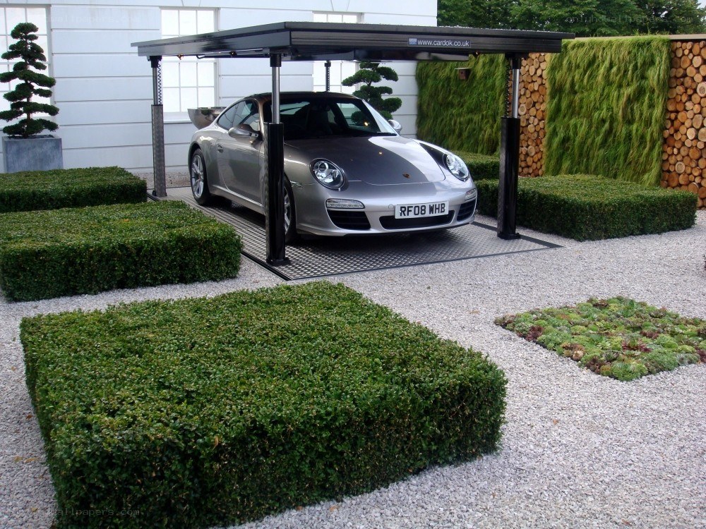 Silver Porsche under carport