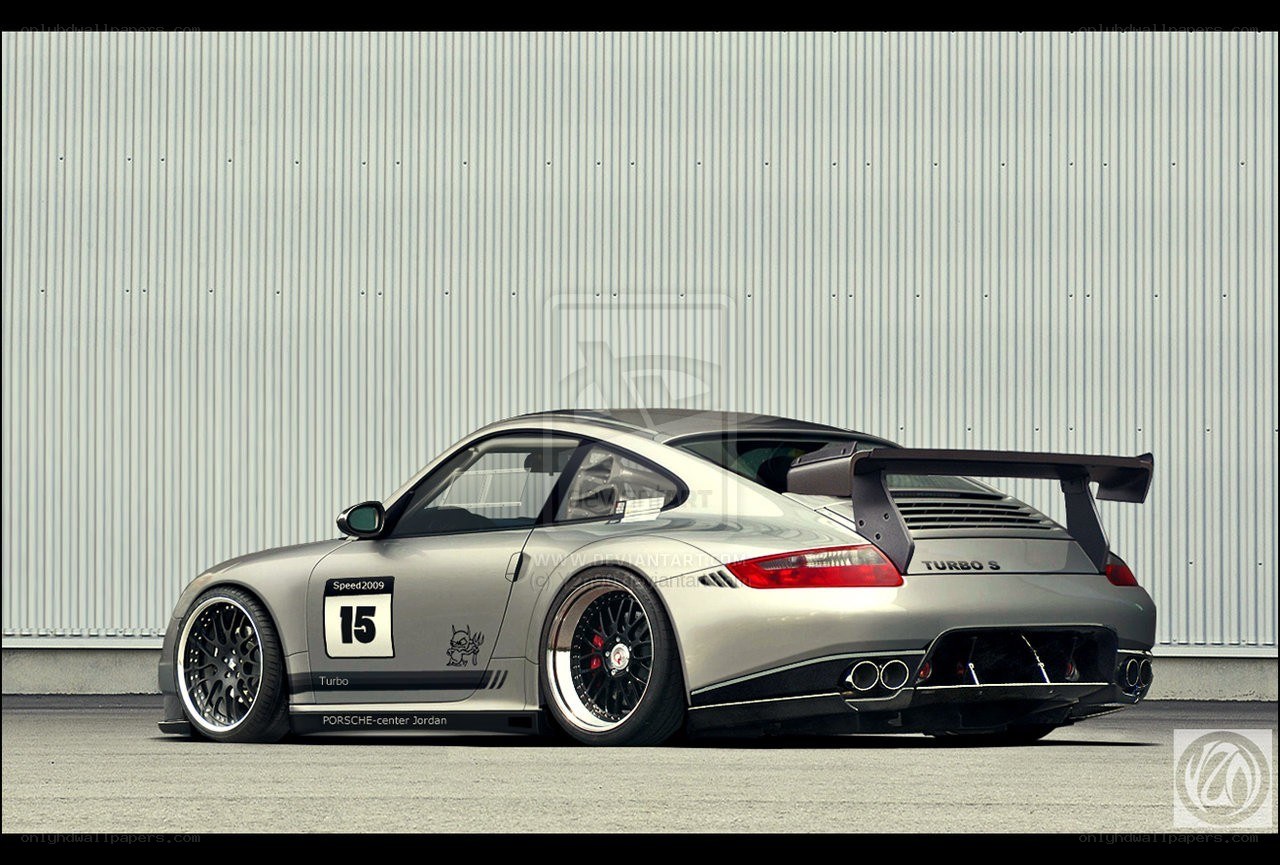 silver porsche with racing decals