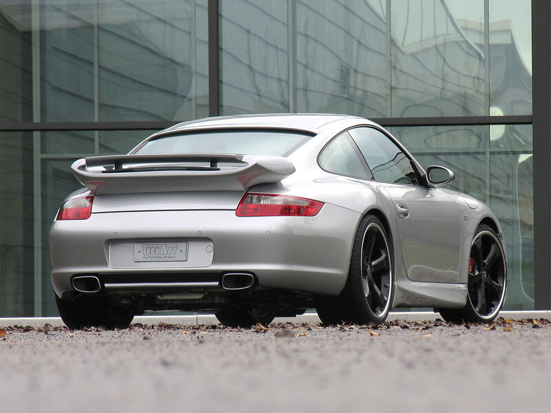 silver porsche with rear spoiler