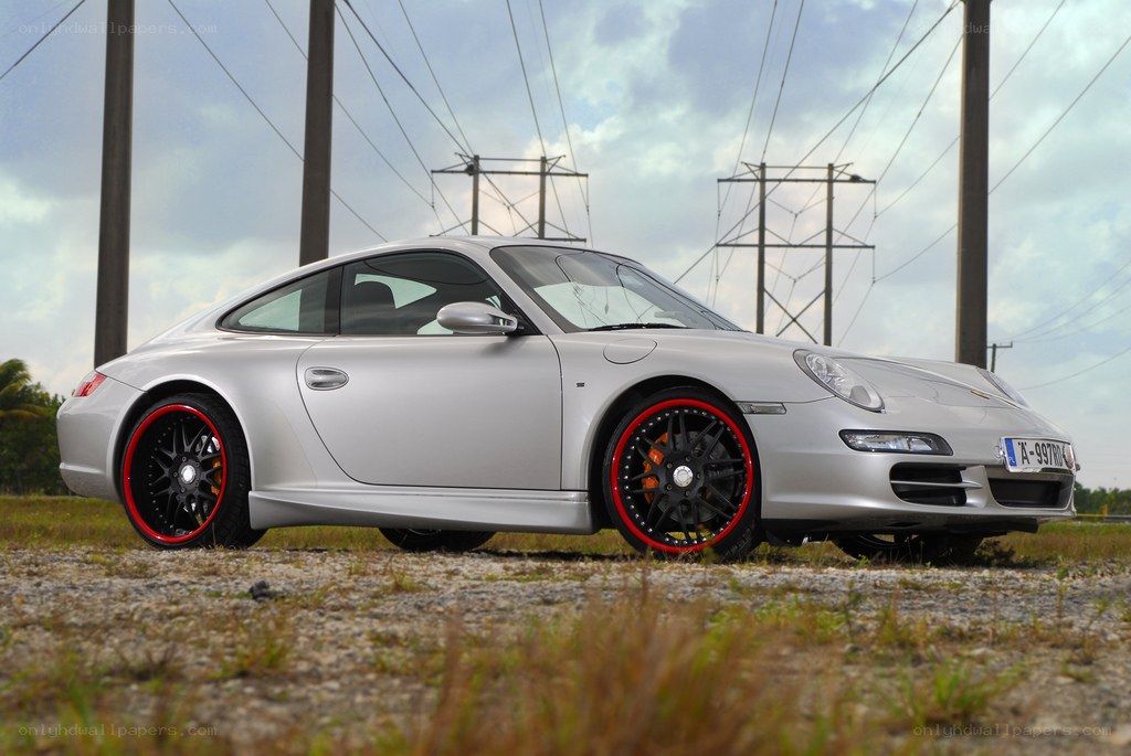 silver porsche with red rims