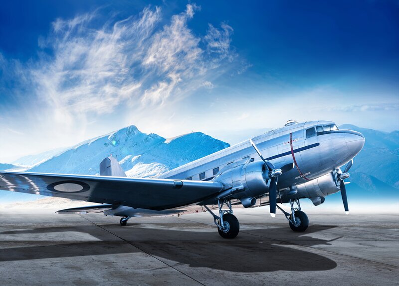 Silver Propeller Airplane — Blue, Dramatic