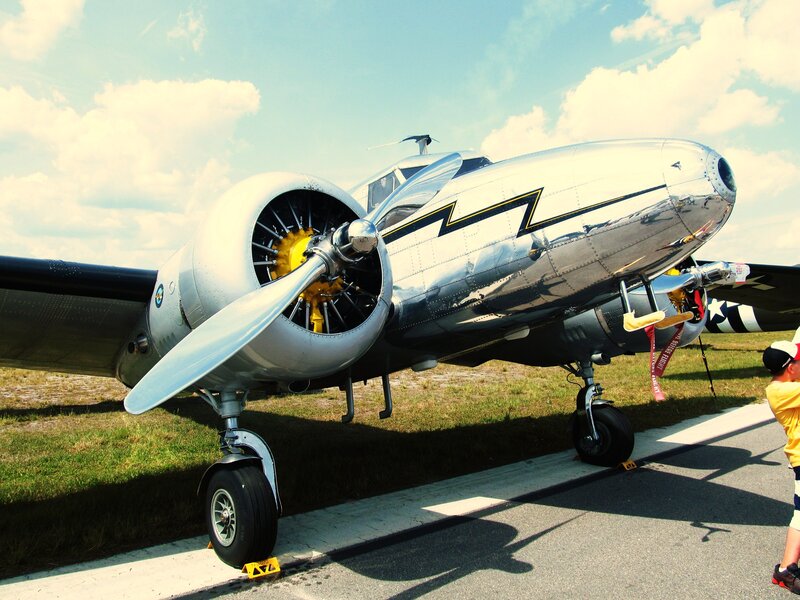Silver Propeller Airplane — Bright
