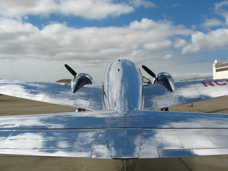 Silver Propeller Airplane — Calm, Afternoon