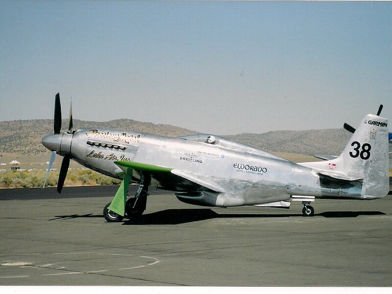 Silver Propeller Airplane — Gray, Calm, Afternoon, Photograph