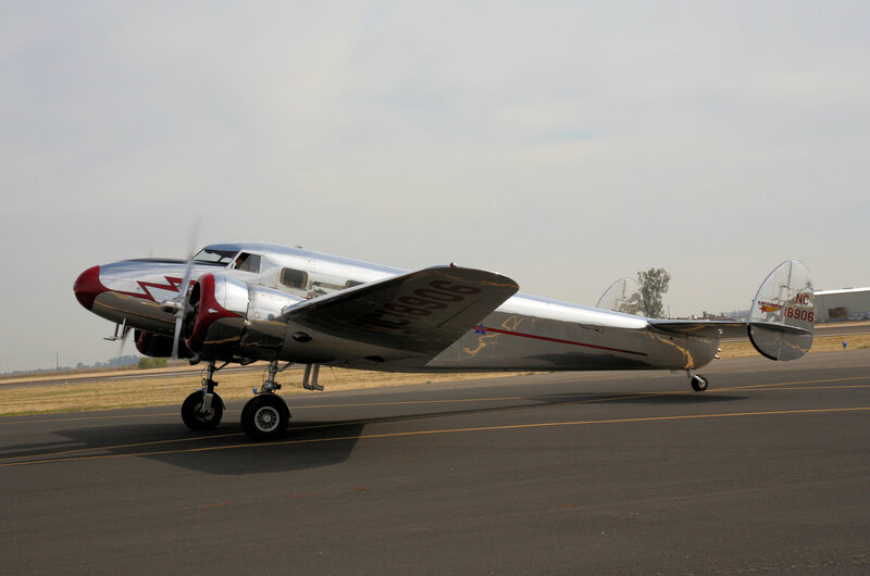 Silver Propeller Airplane — Gray, Calm