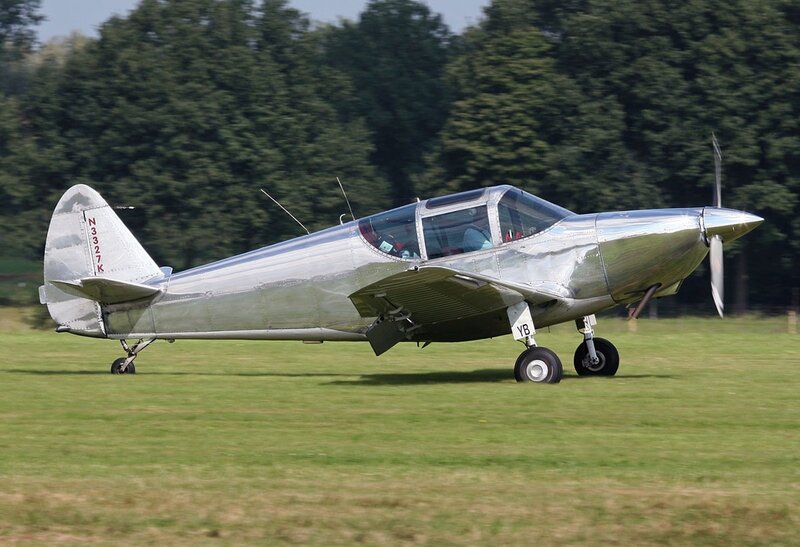 Silver Propeller Airplane — Green
