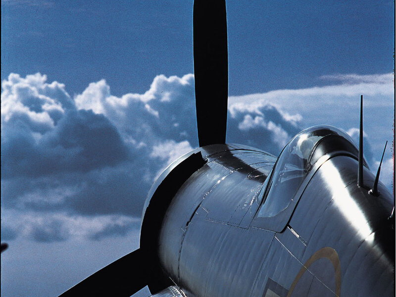Silver Propeller Plane — Blue, Dramatic