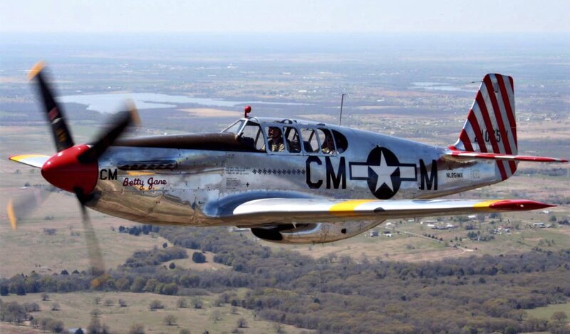 Silver Propeller Plane — Dynamic, Afternoon, Photograph