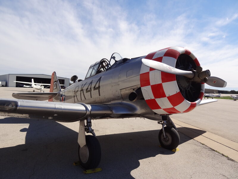 Silver Propeller Plane — Gray, Calm