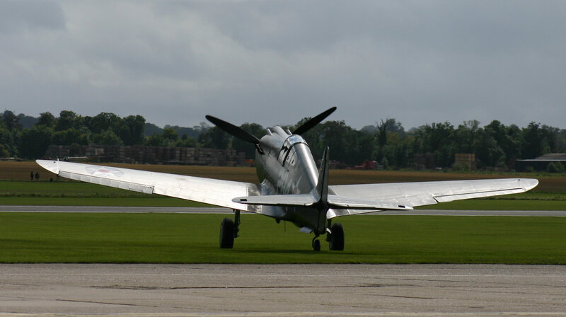 Silver Propeller Plane — Green