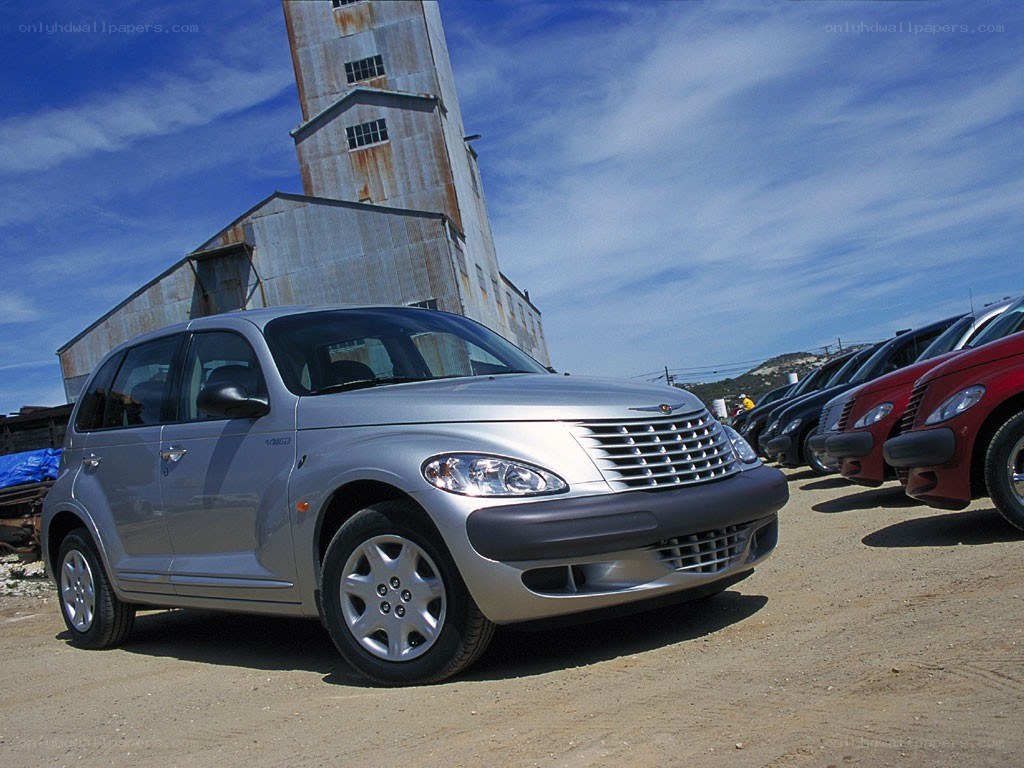 Silver PT Cruiser parked outside