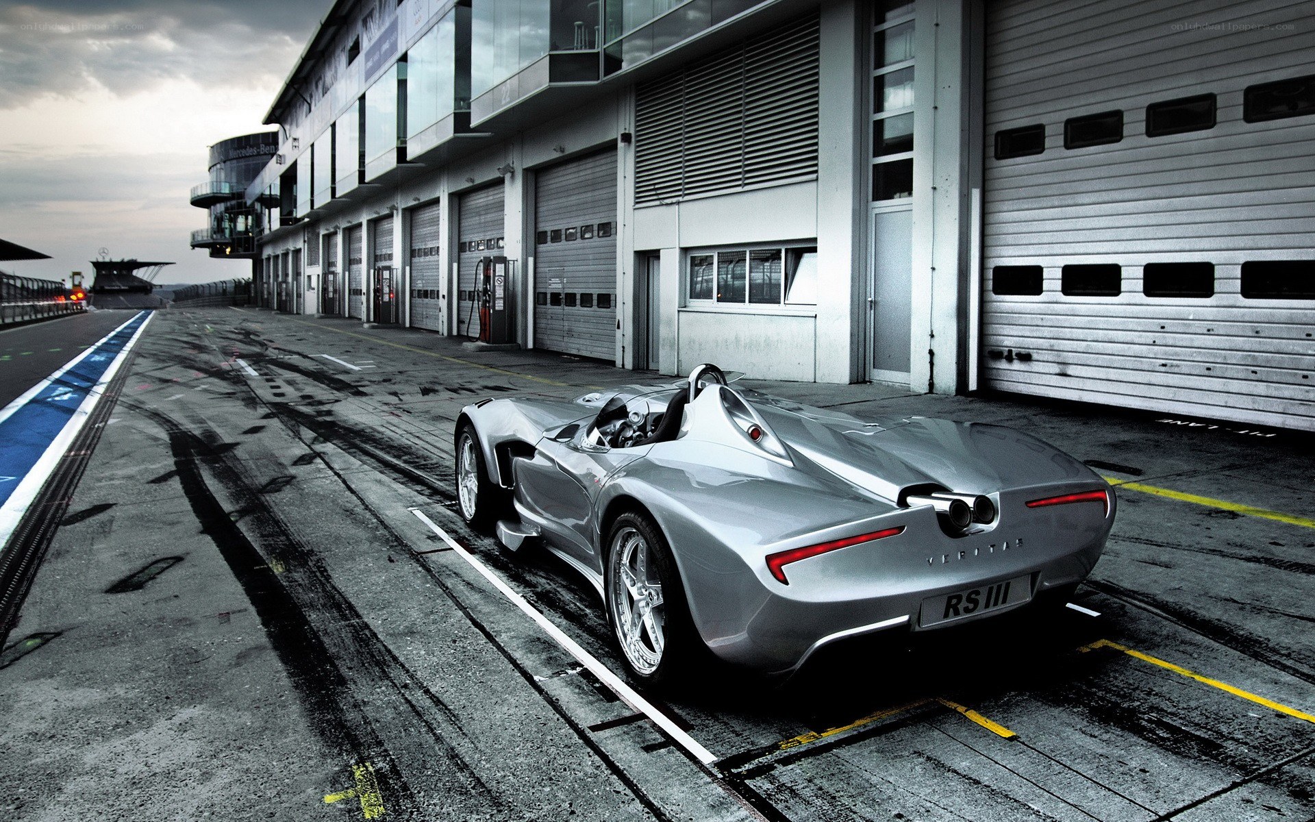 Silver race car at a track