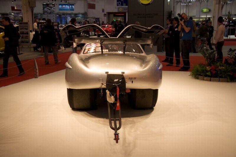 Silver race car at auto show