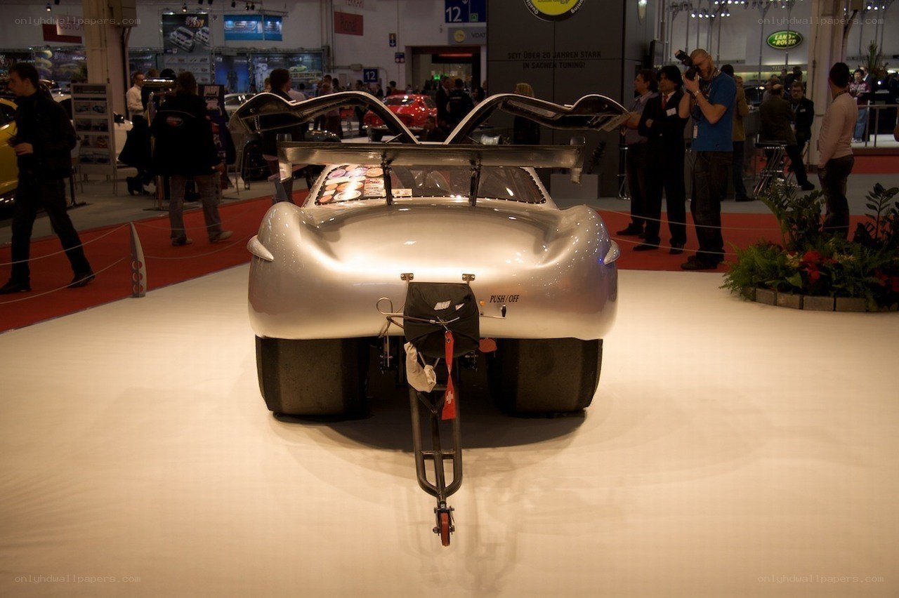 Silver race car at auto show
