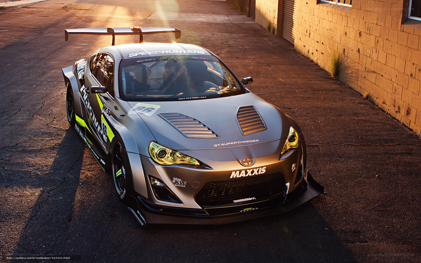 silver race car at sunset