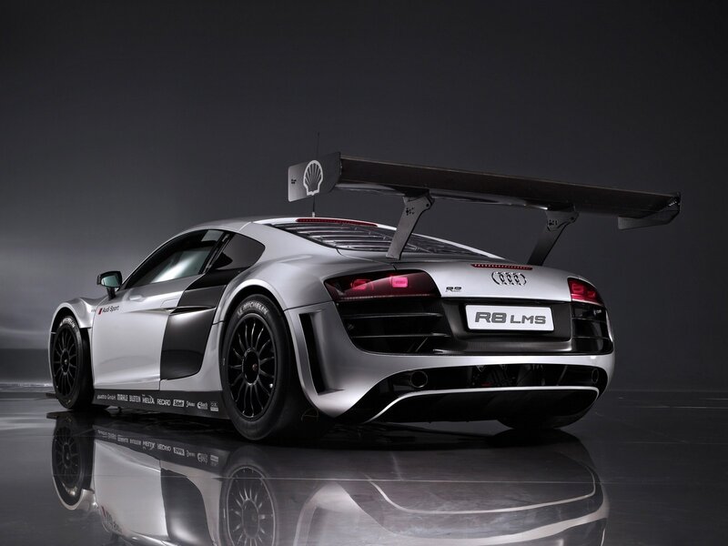 Silver Race Car — Dramatic, Photograph, Large Rear Wing