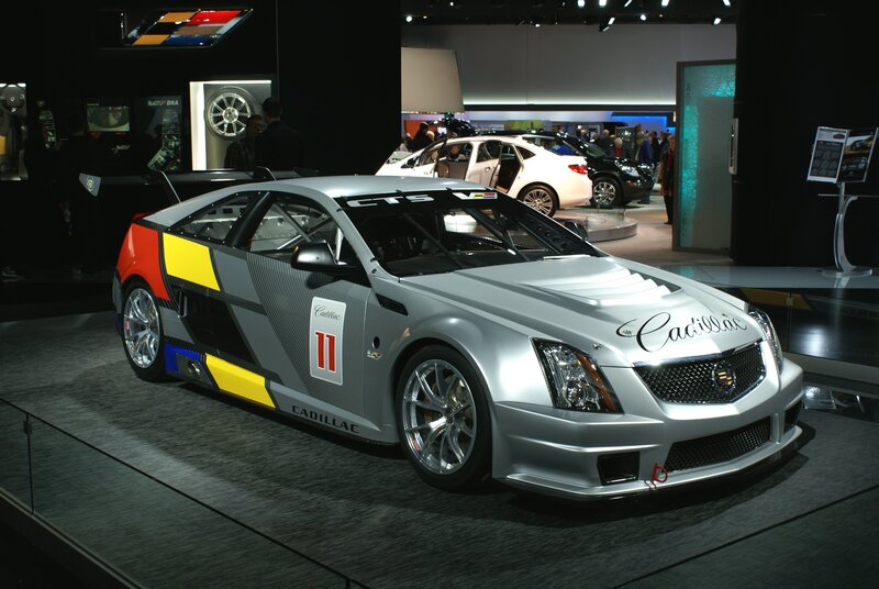 Silver Race Car — Dramatic, Photograph, Race Car, Show Floor