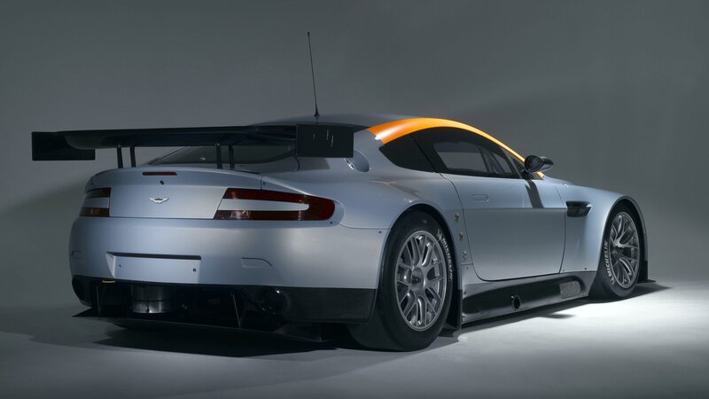 Silver Race Car — Dramatic, Photograph, Rear Wing, Tires