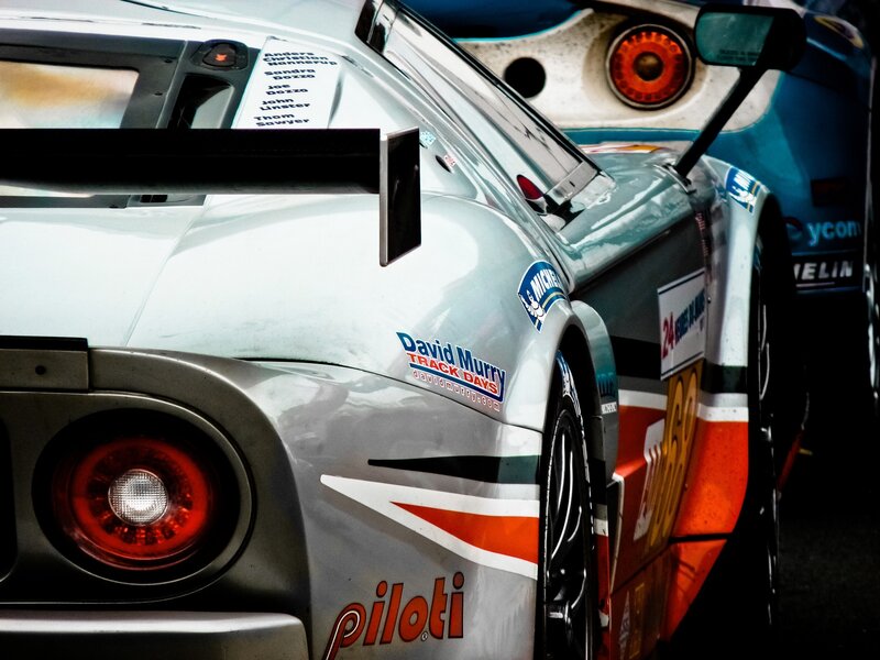 Silver Race Car — Dramatic, Photograph, Tire, Taillight