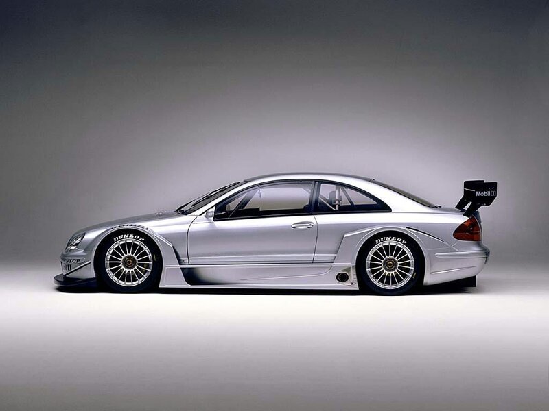 Silver Race Car — Dramatic, Photograph, Tire, Wing