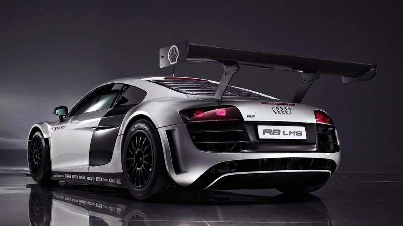 Silver Race Car — Dramatic, Photograph, Wings, Tires, Logo