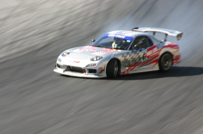 silver race car drifting