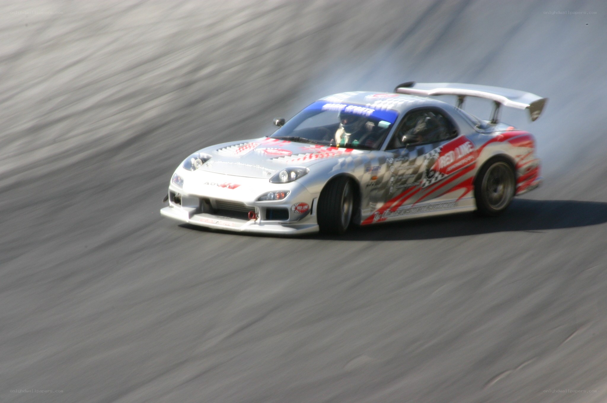 silver race car drifting