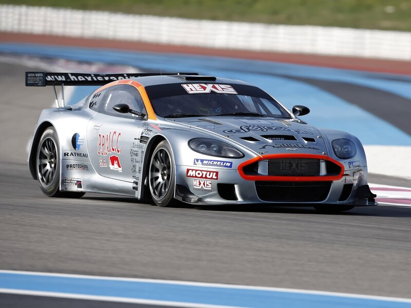 Silver Race Car — Dynamic, Afternoon, Photograph, Race Track, Safety Barrier