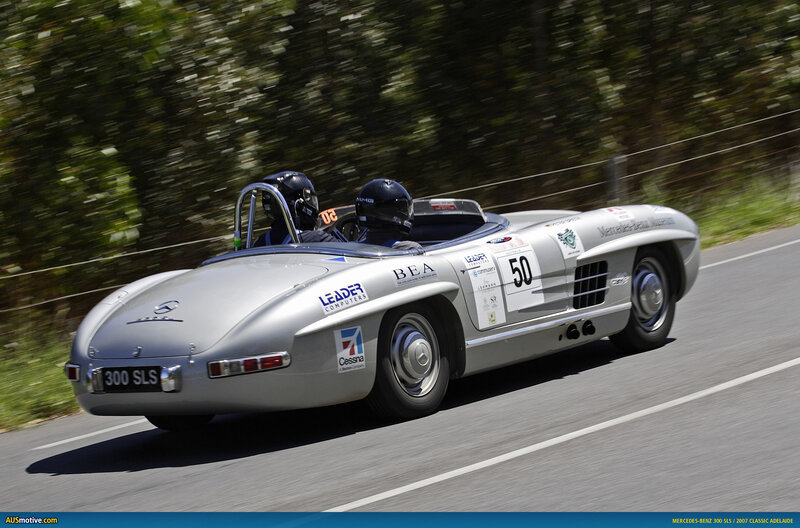 Silver Race Car — Dynamic, Afternoon, Photograph, Two People, Trees