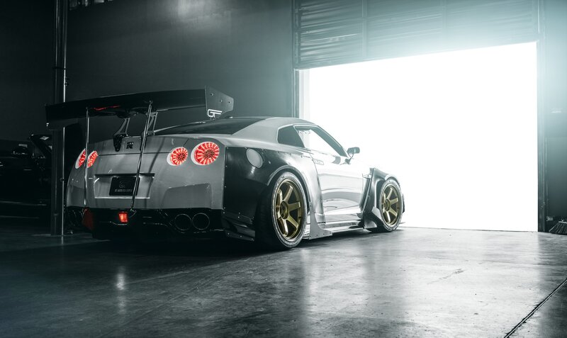 Silver Race Car — Gray, Dramatic, Photograph, Garage