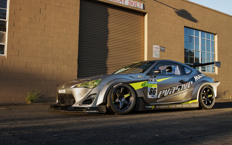 Silver Race Car — Gray, Dramatic, Sunset, Photograph, Building