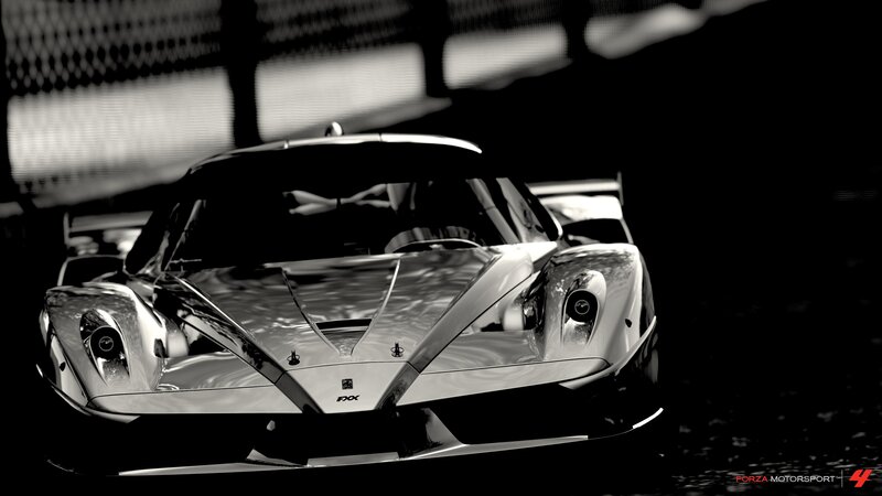 silver race car in black and white