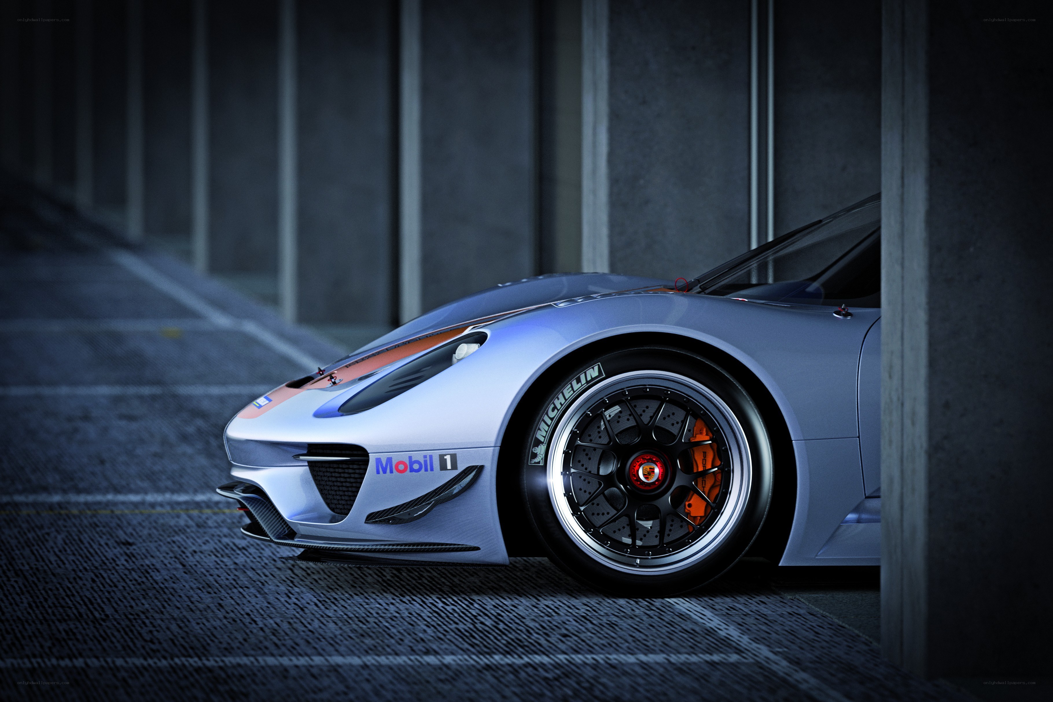silver race car in garage