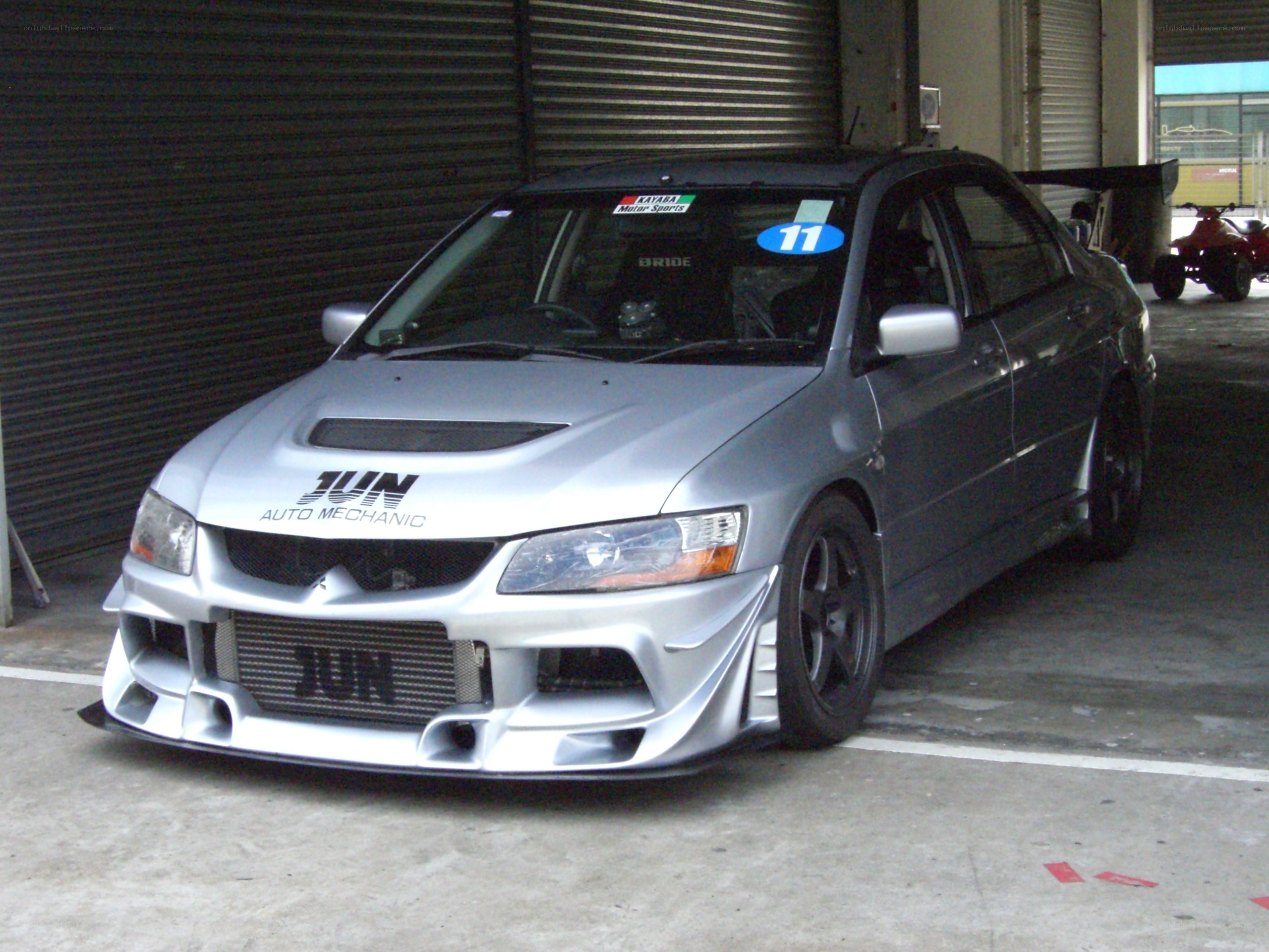 silver race car in garage