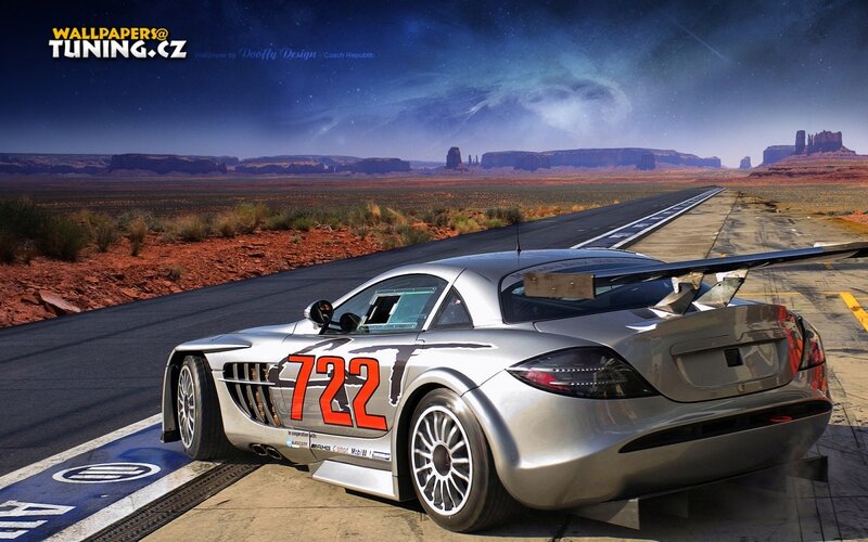 Silver race car on desert track