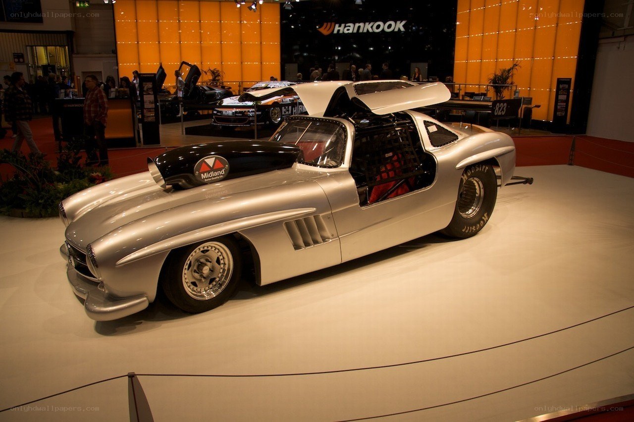 Silver race car on display
