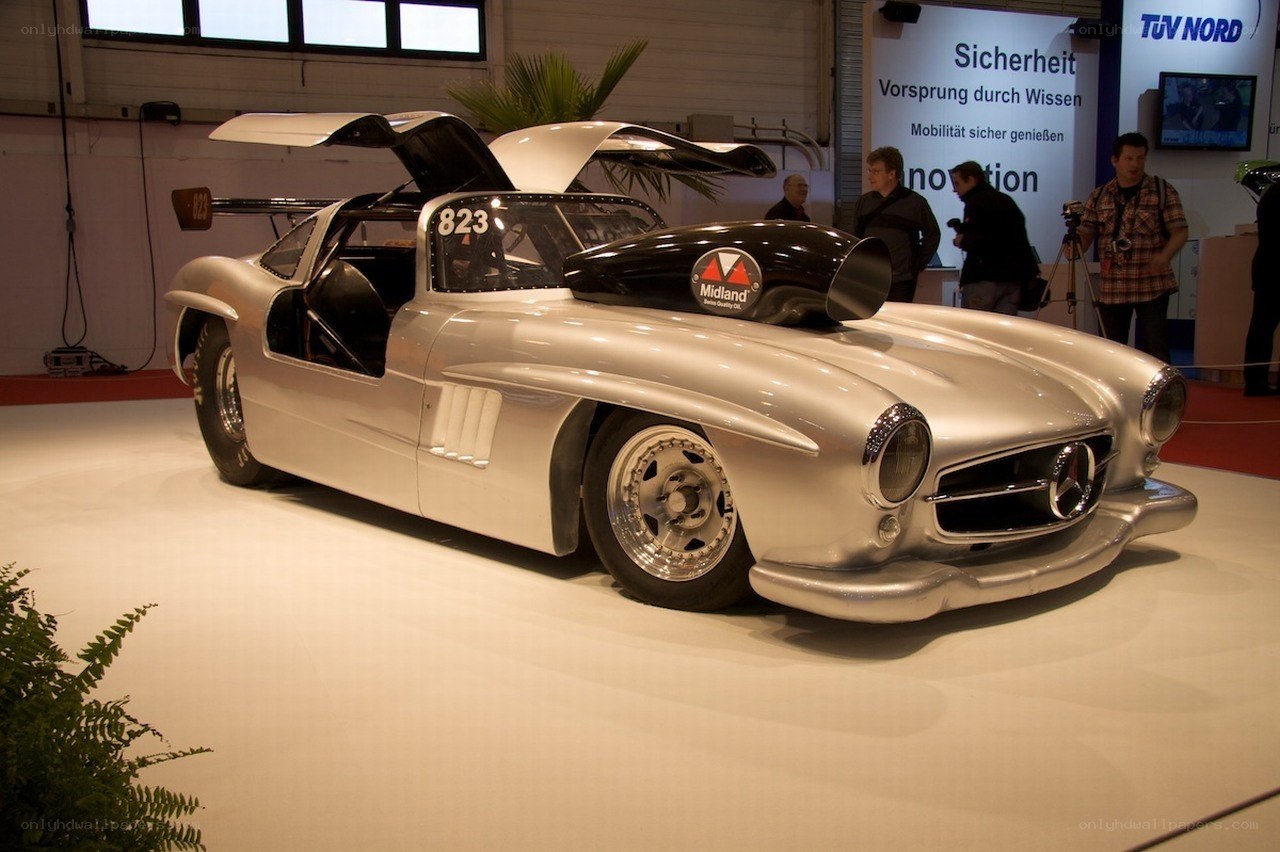 Silver race car on display