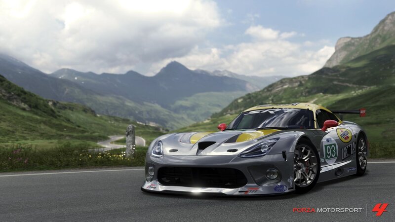 Silver race car on mountain road