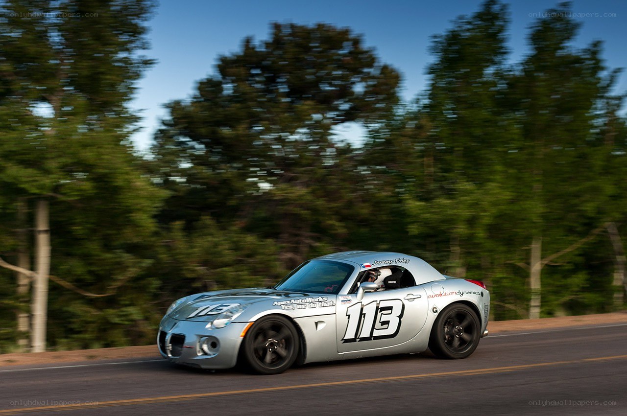 silver race car on road