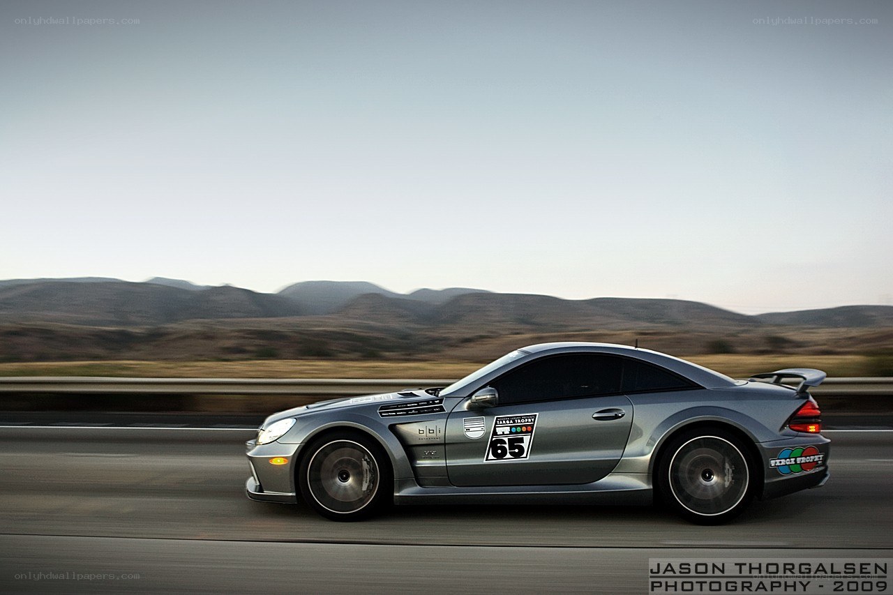 silver race car on road