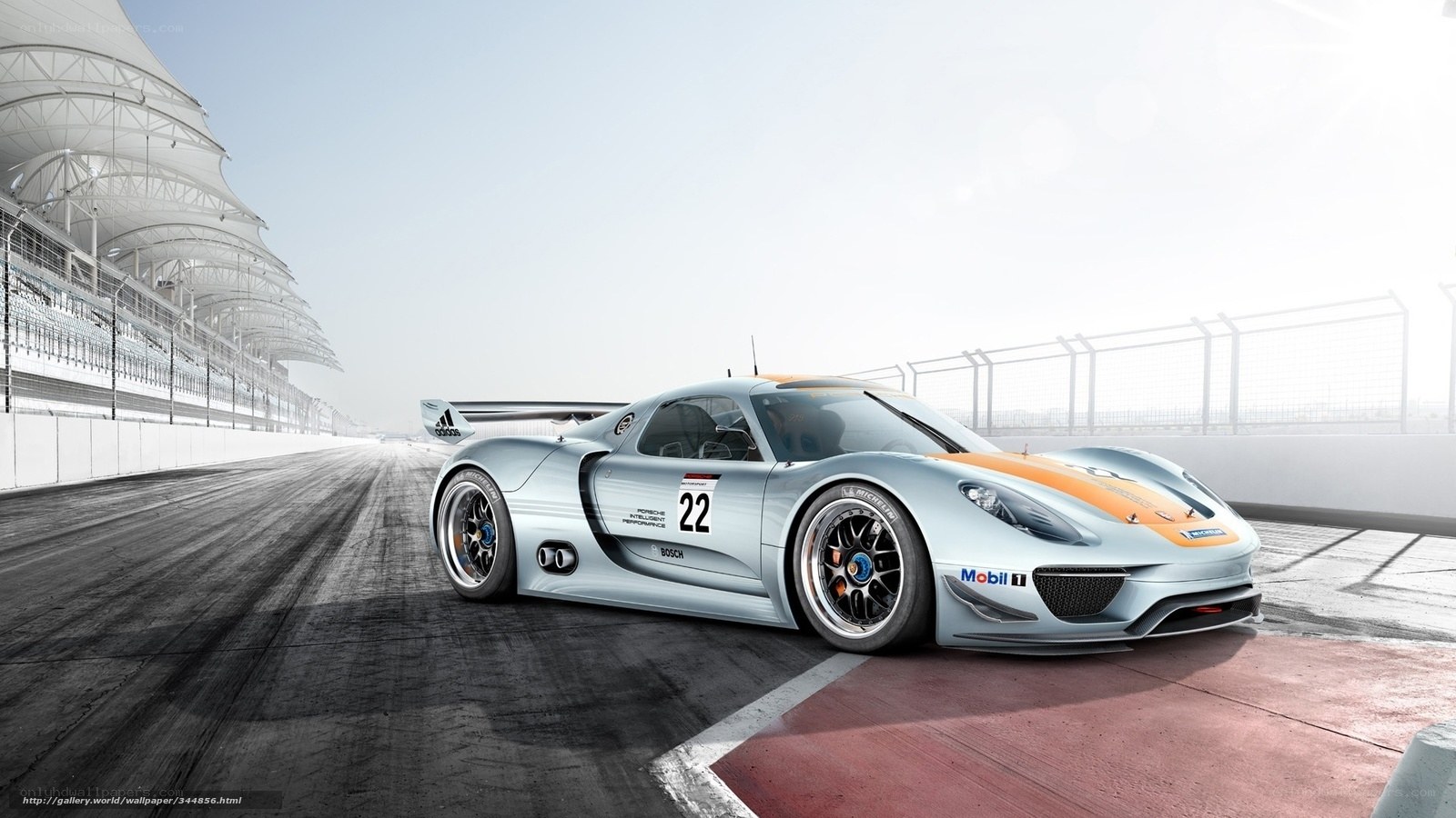 Silver race car on track