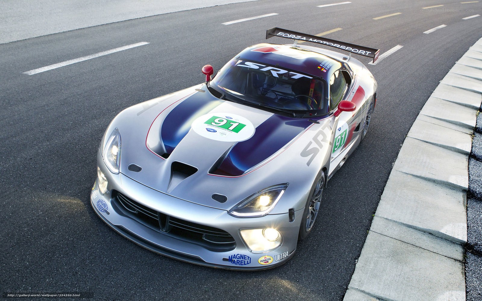 Silver race car on track